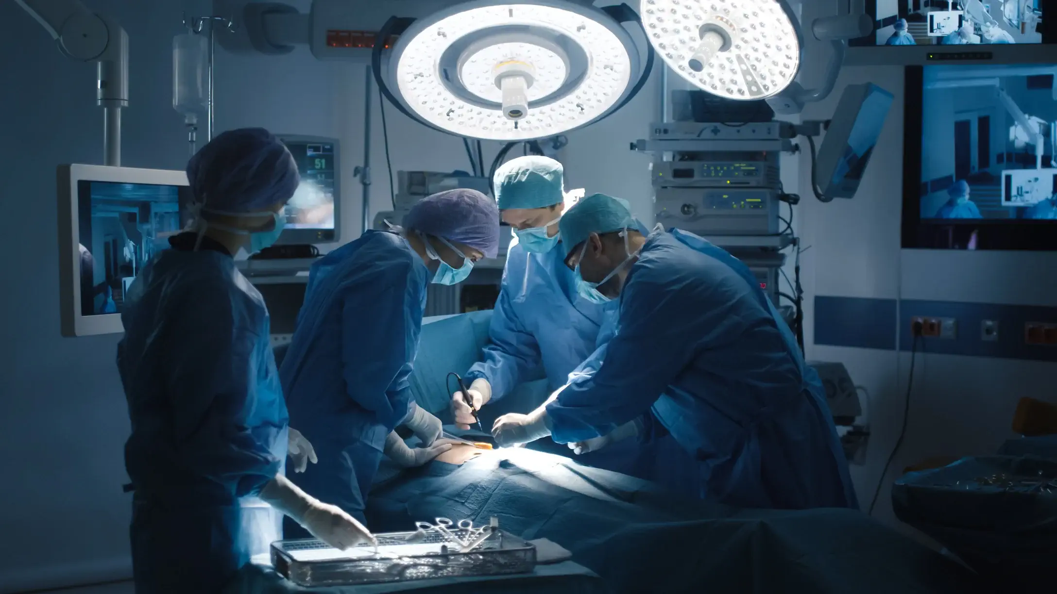 Surgeons operating in an operating room